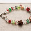50fe33fc-08ce-4738-a71a-f7b670a409c8 Handcrafted Holiday Gingerbread & Cookie Charm Phone Lanyard
