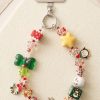 980b3962-8832-4ec4-9958-4d36bcfe7d91 Handcrafted Festive Phone Charm & Wrist Strap