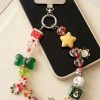 d3e2d350-8553-4b47-9468-8ebc43bc30eb Handcrafted Festive Phone Charm & Wrist Strap